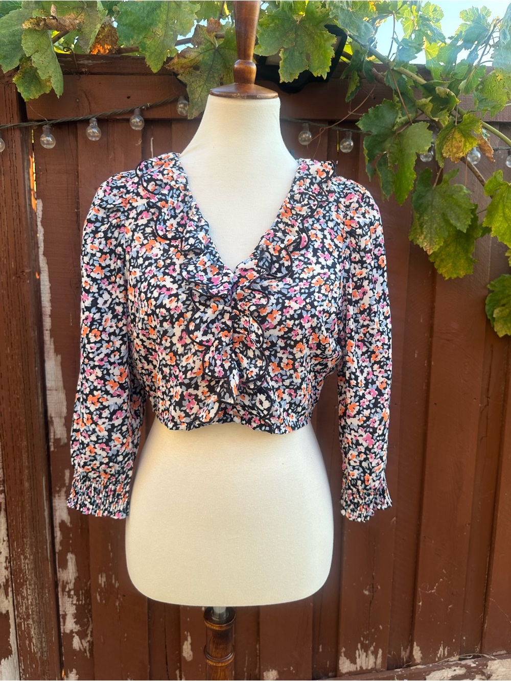 Vero Moda Black Floral Ruffle Crop Top with Pink & Orange Accents